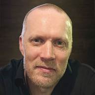 A person with a beard

AI-generated content may be incorrect.